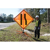 Tilt-Adjust Merge Left Roll-Up Construction Sign, 36" x 36", Vinyl, Pictogram PB Rental Co. Ltd.